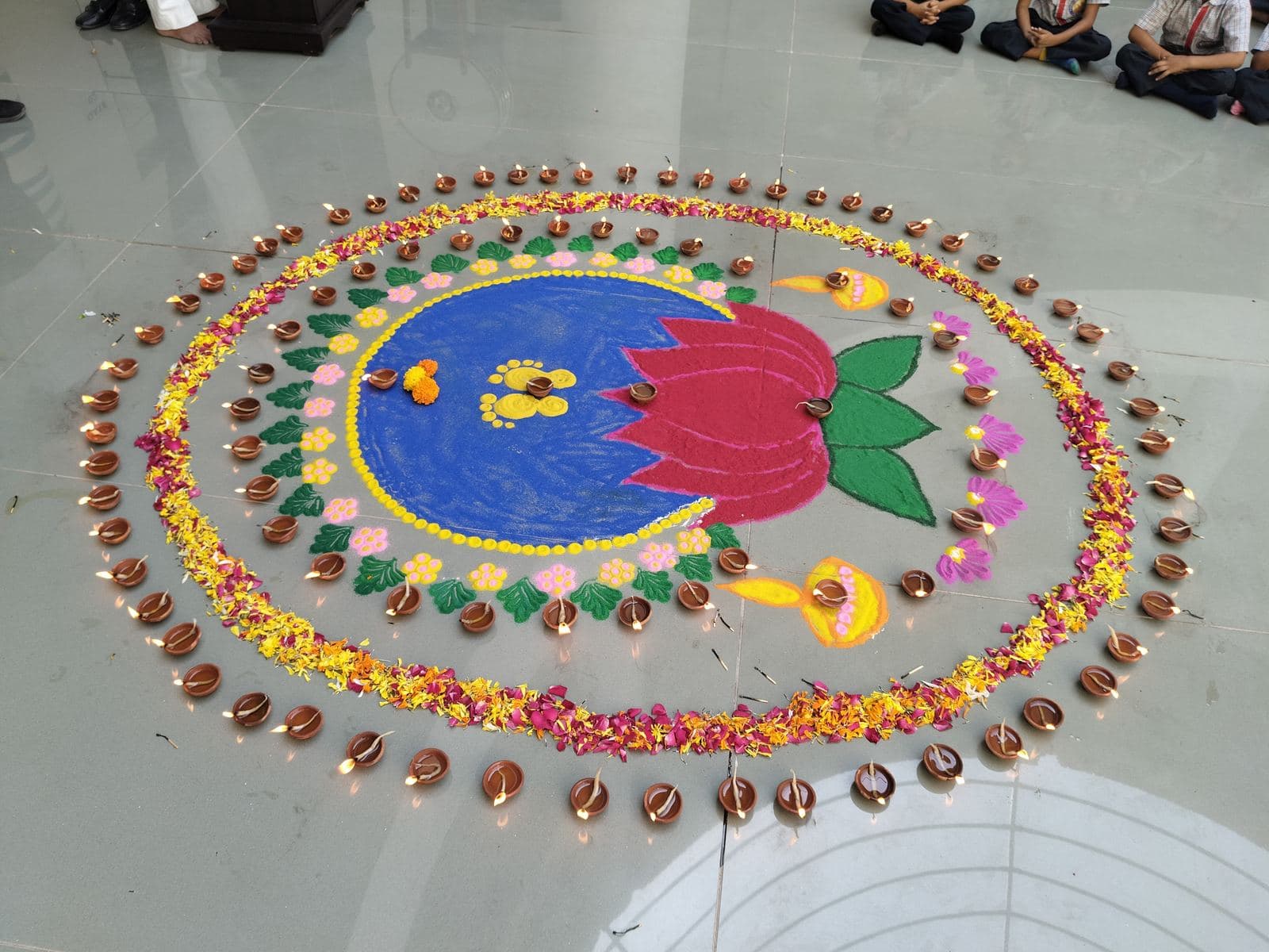 A diya rangoli made by students